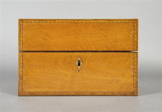 Appraisal: An English Satinwood and Walnut Tea Caddy Height x width