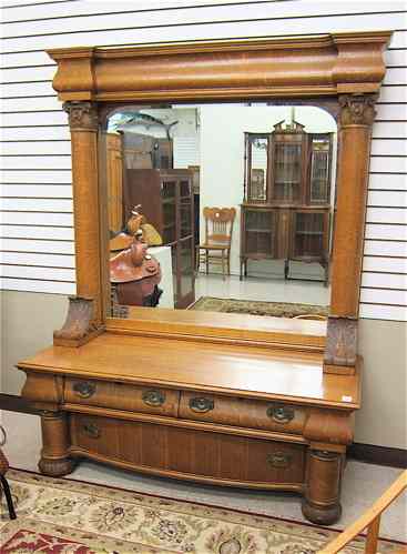 Appraisal: AN UNUSUAL OAK LOW DRESSER WITH EXTRAORDINARY MIRROR American c