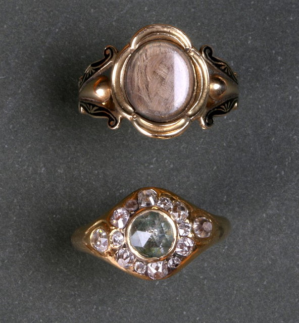 Appraisal: A VICTORIAN MOURNING RING with an oval panel with inset