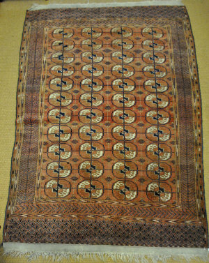 Appraisal: A Turkoman rug the four rows of guls on red