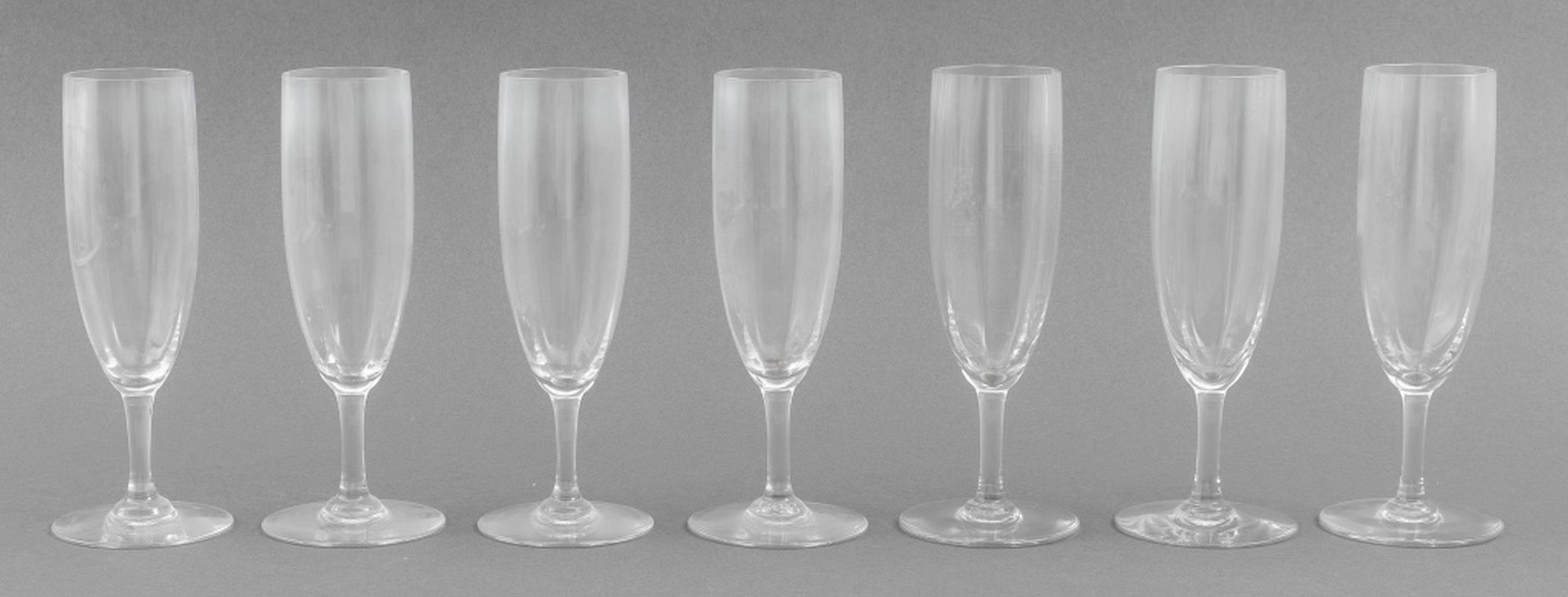 Appraisal: BACCARAT CRYSTAL CHAMPAGNE FLUTES Seven Baccarat crystal champagne flutes with