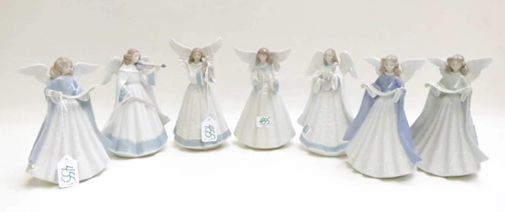 Appraisal: SEVEN LLADRO PORCELAIN ANGEL TREE TOPPERS including Angel Tree Topper