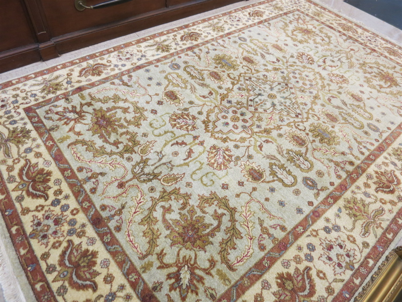 Appraisal: HAND KNOTTED ORIENTAL CARPET Indo-Persian overall floral decoration on light