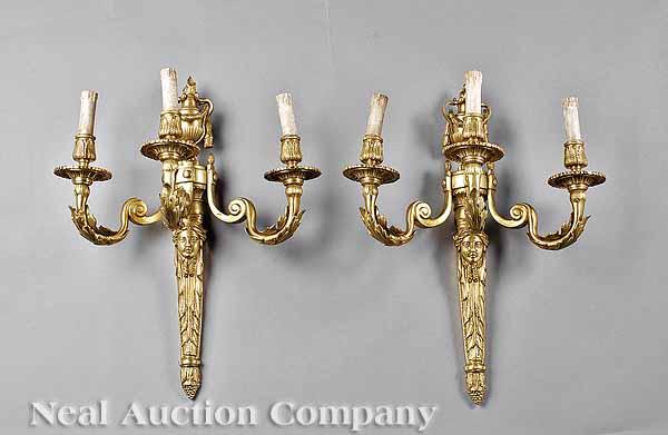 Appraisal: A Pair of Louis XVI-Style Gilt Bronze Three-Light Appliqu s