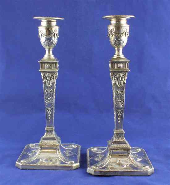 Appraisal: A pair of Victorian silver Adam style candlesticks with tapering