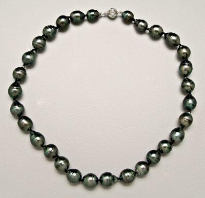 Appraisal: Black Tahitian pearl necklace baroque circled cultured pearls to mm