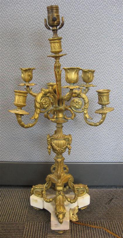 Appraisal: Louis XV gilt bronze and white marble six arm candelabrum