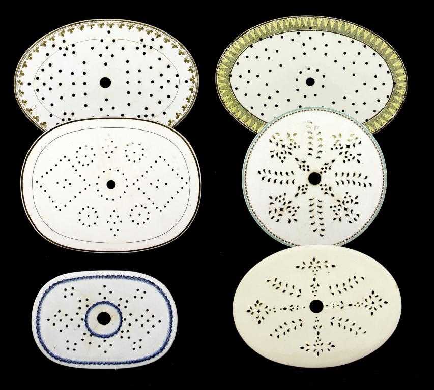 Appraisal: FIVE SPODE WEDGWOOD AND UNATTRIBUTED CREAMWARE DRAINERS AND A PEARLWARE