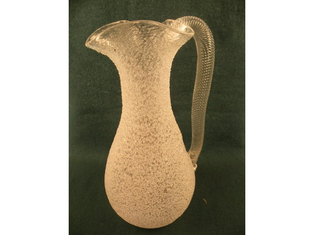 Appraisal: A wine or champagne ewer with a cracked glass type