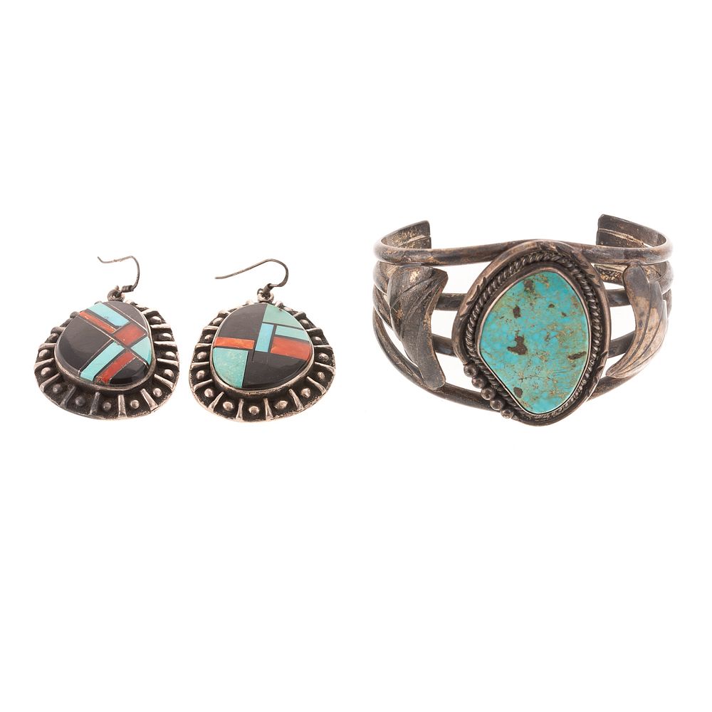 Appraisal: A Sterling Navajo Bracelet Earrings sterling silver cuff bracelet featuring