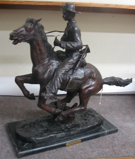 Appraisal: WESTERN BRONZE SCULPTURE Trooper of the Plains after the works