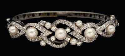 Appraisal: Diamond pearl bracelet kt white gold swirl design accented with