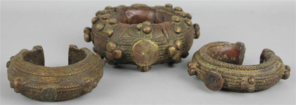 Appraisal: THREE DOGON BRONZE BRACELETS FROM MALI with age the larger