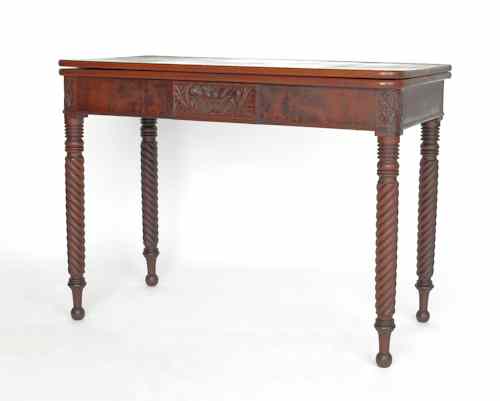 Appraisal: Sheraton mahogany card table ca with carved facade and corners