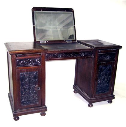 Appraisal: Classical style mahogany pedestal dressing tableWith center drawer flanked by