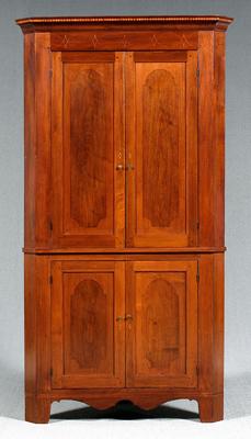 Appraisal: Virginia walnut corner cupboard dentil and line inlaid pediment tombstone