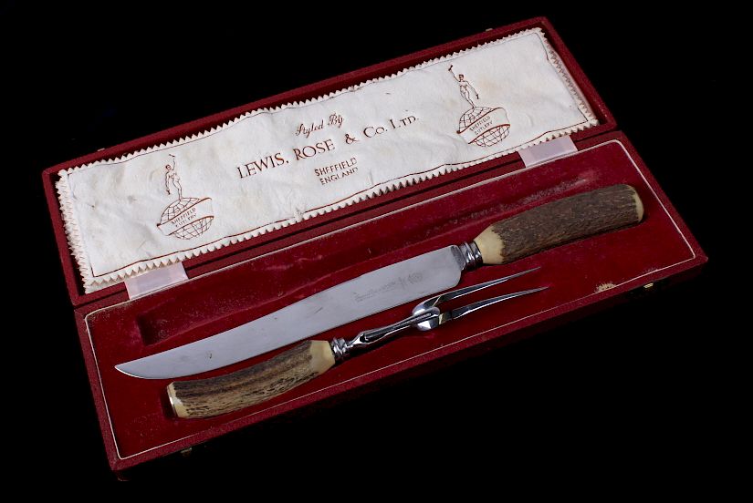 Appraisal: Stag Handled Cutlery Steak Knife And Fork Set This is