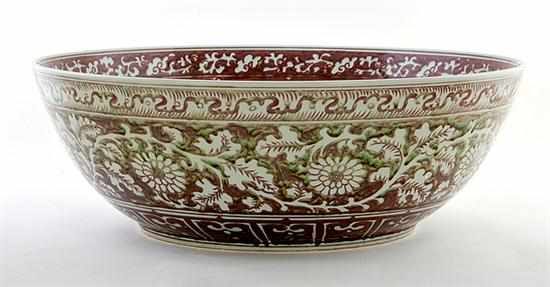 Appraisal: Massive Chinese Export porcelain centerbowl decorated in floral design H