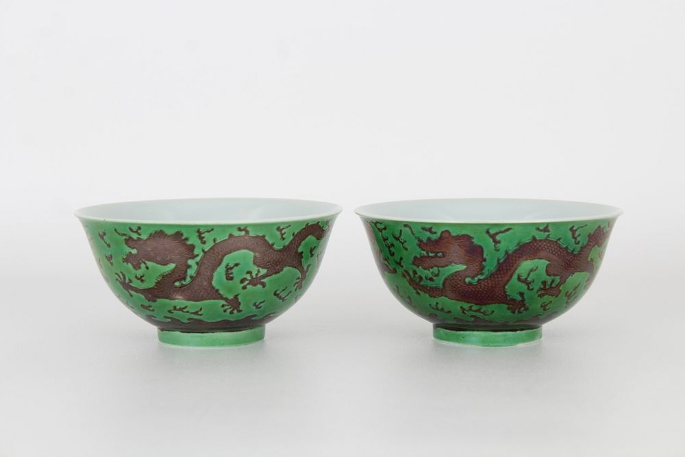 Appraisal: Pair of Aubergine-Green Dragon Porcelain Bowls Rare Pair of Aubergine-Green