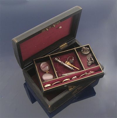 Appraisal: A jewellery box containing a diamond five stone ring three