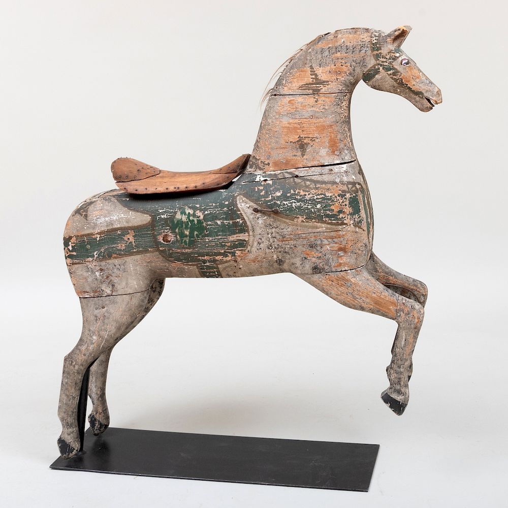 Appraisal: French Polychrome Painted Wood Carousel Horse Fitted with glass eyes