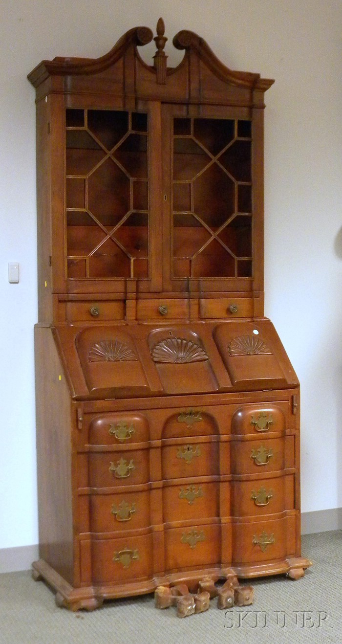 Appraisal: Chippendale-style Glazed Carved Mahogany Slant-lid Blockfront Desk Bookcase missing glass