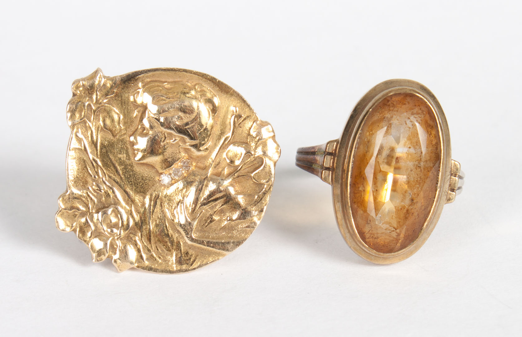 Appraisal: Two vintage gold rings with diamond or citrine comprising Art