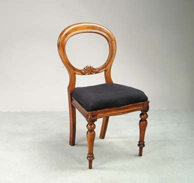 Appraisal: REGENCY WALNUT SIDE CHAIR Slip on black upholstered seat serpentine