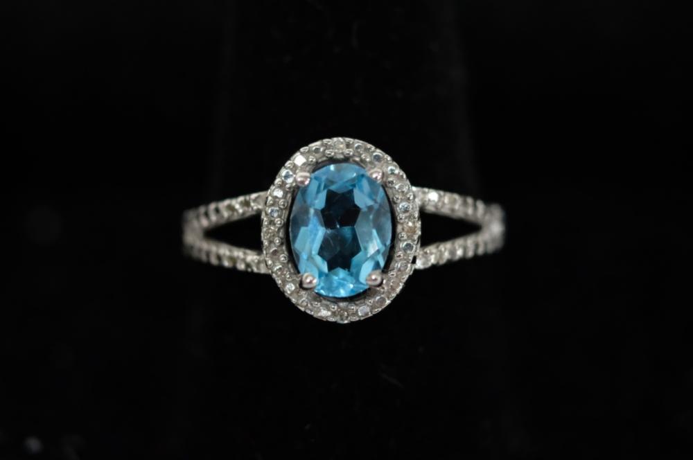 Appraisal: K WG TOPAZ AND DIAMOND RING SZ k White gold