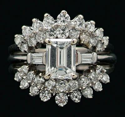 Appraisal: Diamond wedding set engagement ring with central emerald-cut diamond estimated