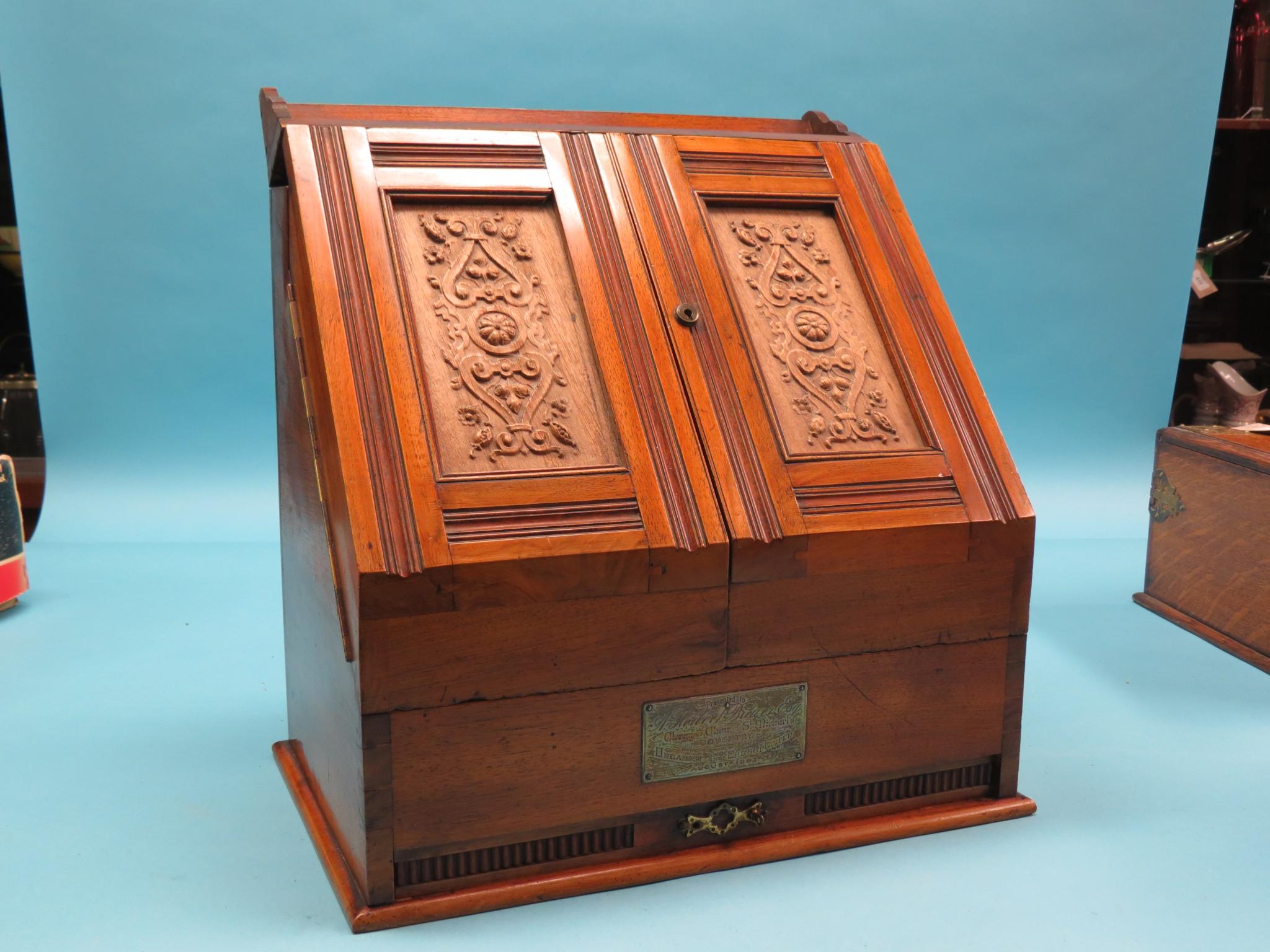 Appraisal: A Victorian walnut stationery box enclosed by a pair of