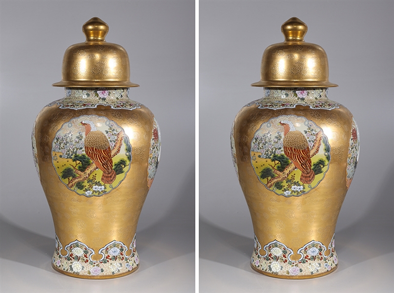 Appraisal: Pair of large Chinese gilt and enameled porcelain covered vases