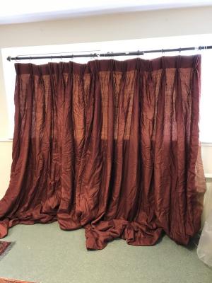 Appraisal: A pair of dark red silk curtains with pelmet and