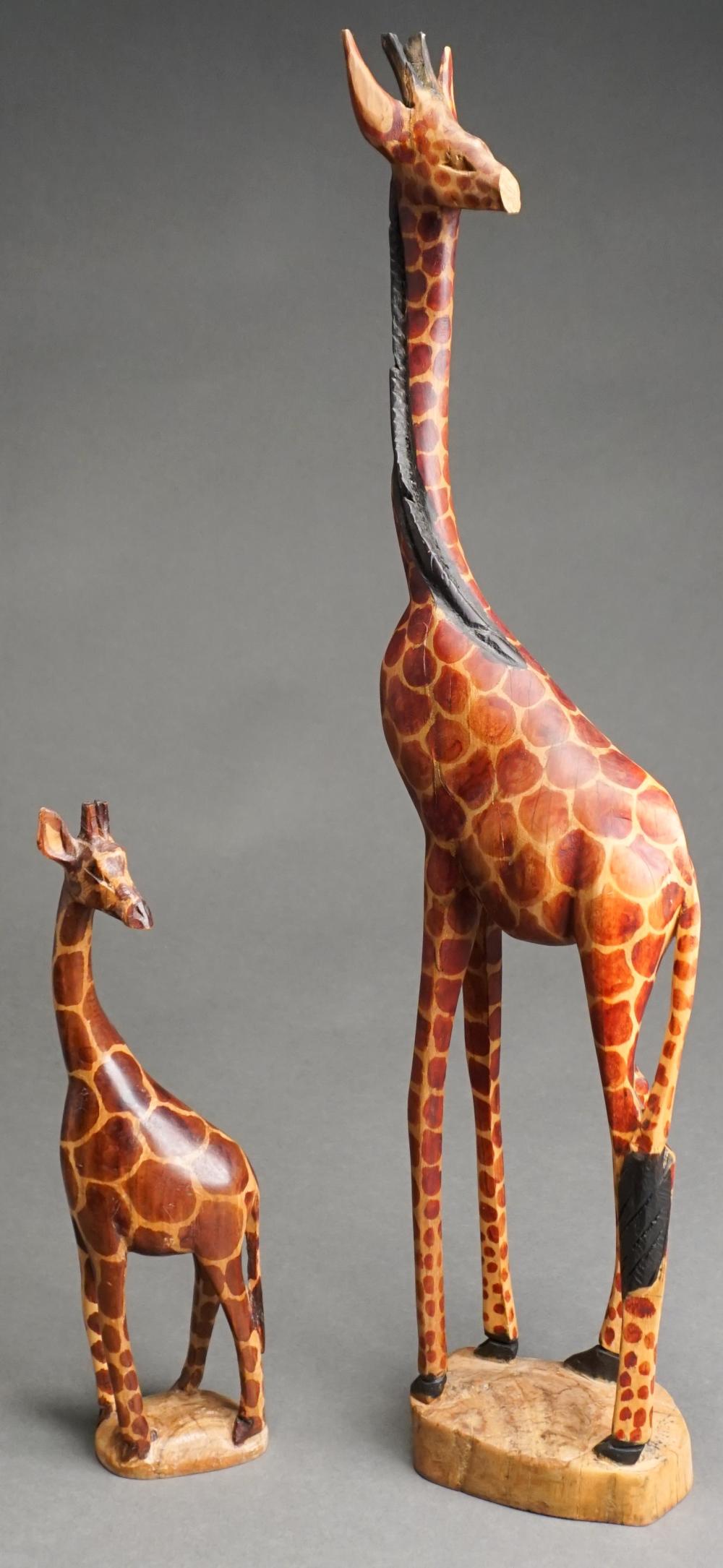 Appraisal: Two Contemporary Carved Wood Figures of Giraffes H of taller