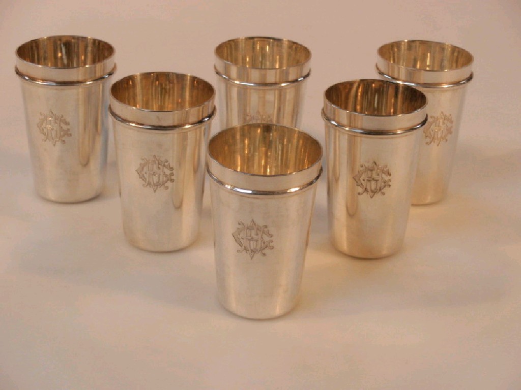 Appraisal: A set of six electroplated sporting beakers of tapering form