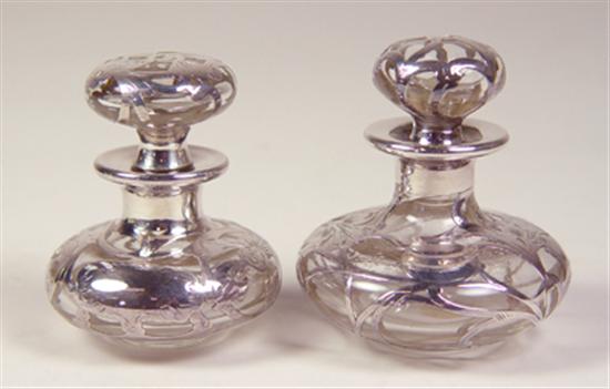 Appraisal: Two Sterling Silver Perfume Bottles Both with matching stoppers and