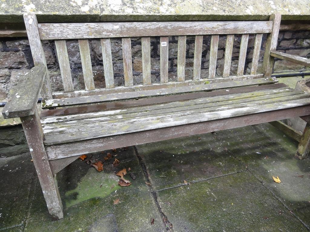 Appraisal: A Lister weathered teakwood garden bench with slatted seat and