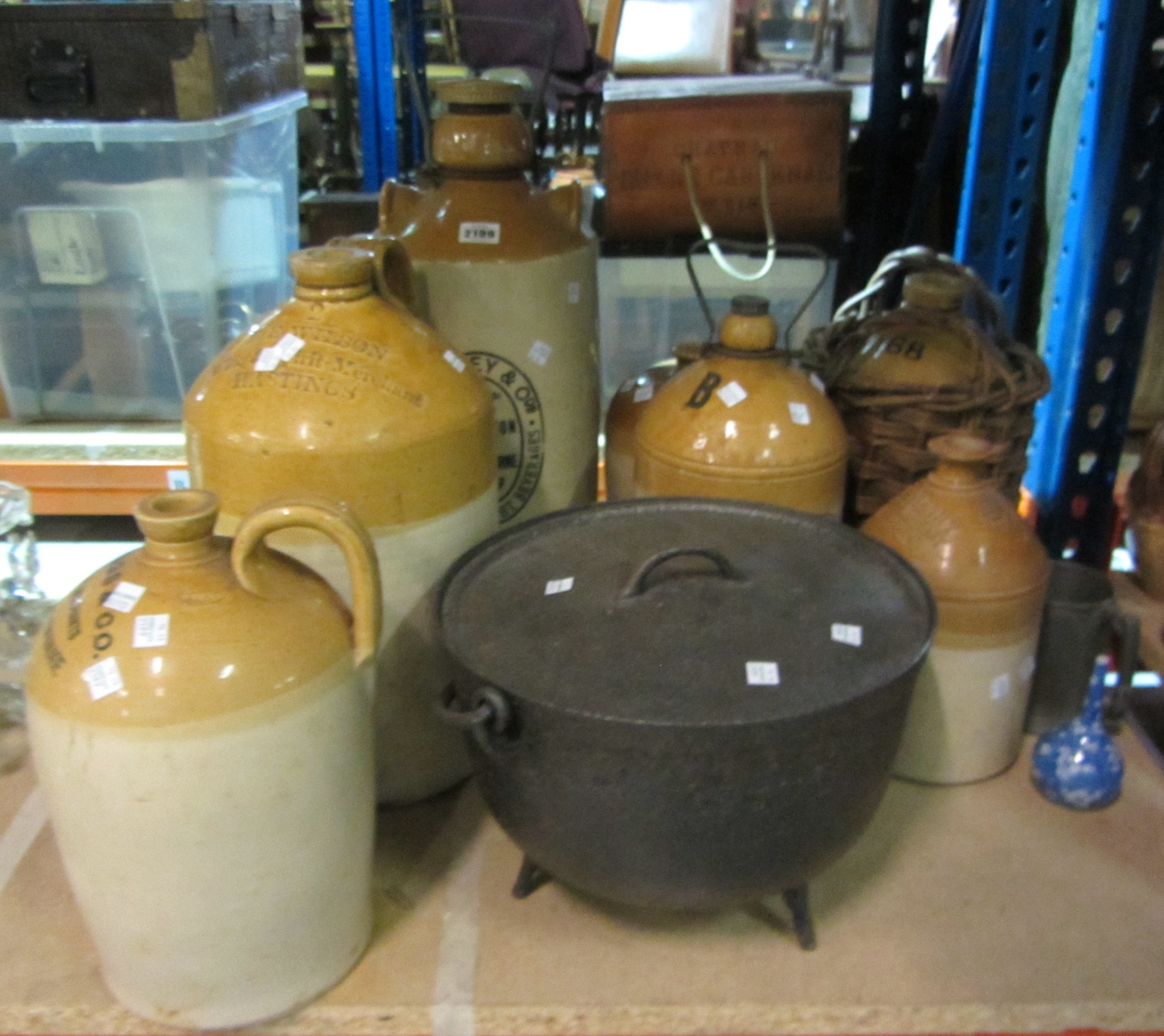 Appraisal: A group of collectables including six large stoneware bottles and