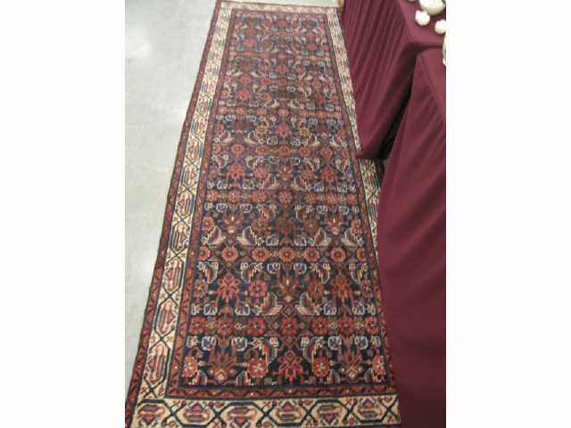 Appraisal: Heriz Persian Handmade Runner triple geometric medallions on red field