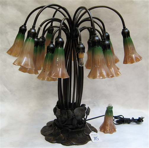 Appraisal: A TIFFANY STYLE LILY TABLE LAMP -lights having art glass