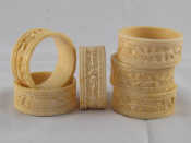 Appraisal: A set of six ivory napkin rings well carved with