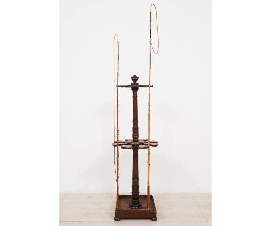 Appraisal: English mahogany carved whip stand square base with copper metal