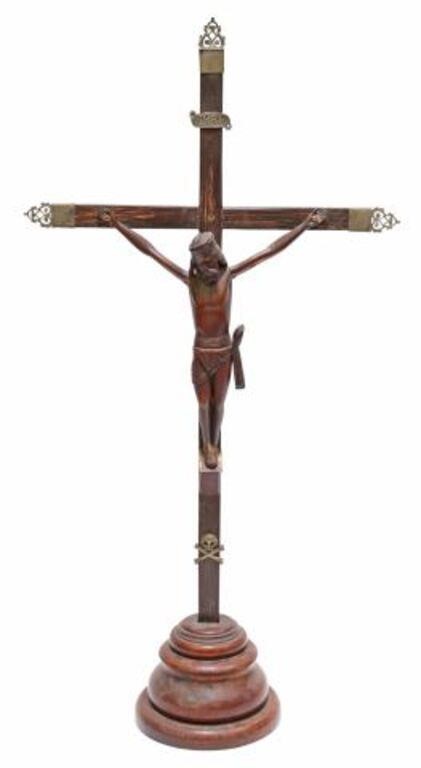 Appraisal: Carved wood crucifix cross with silver-tone metal terminals on a