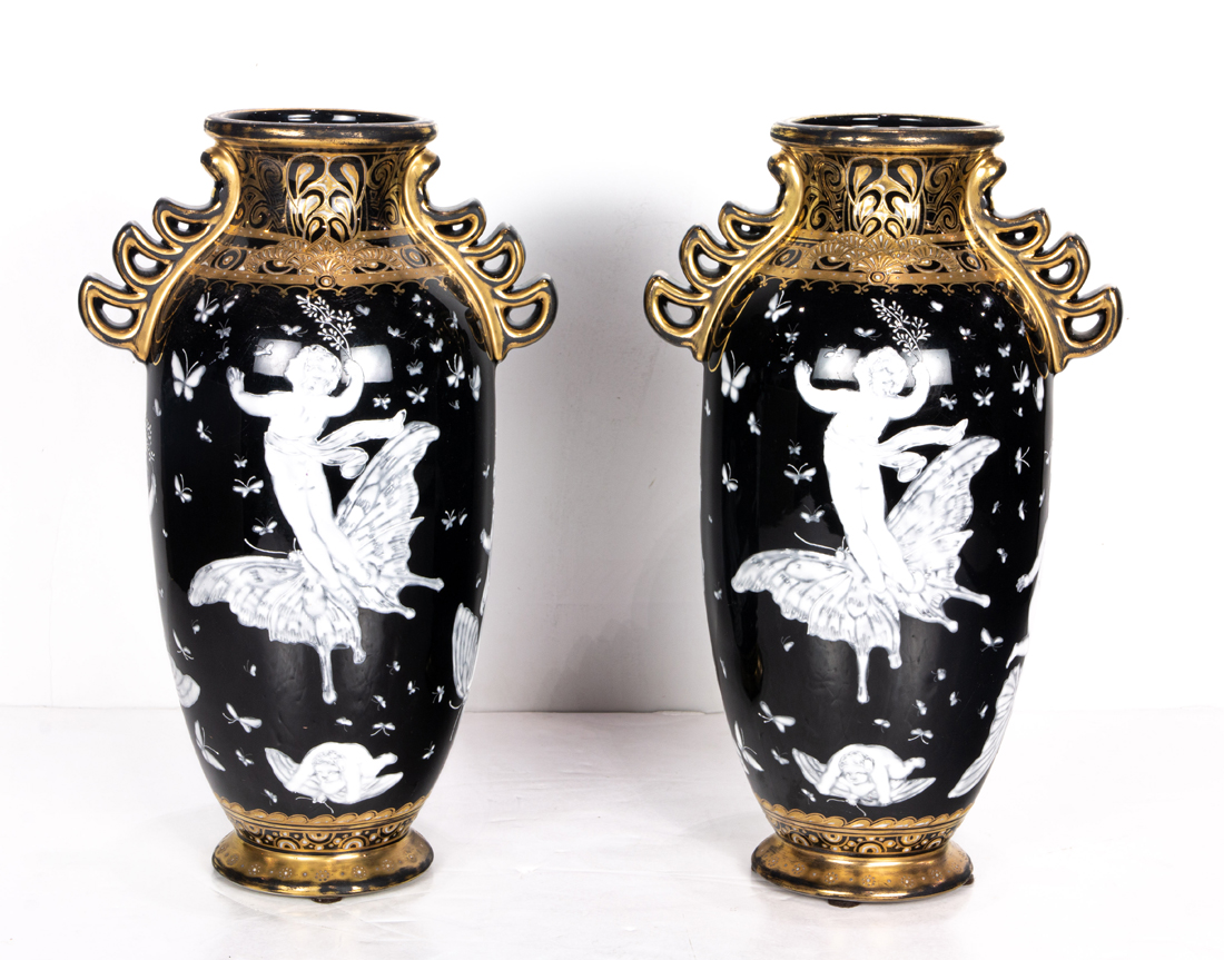 Appraisal: PAIR OF MINTON STYLE ENAMEL DECORATED CERAMIC URNS Pair of