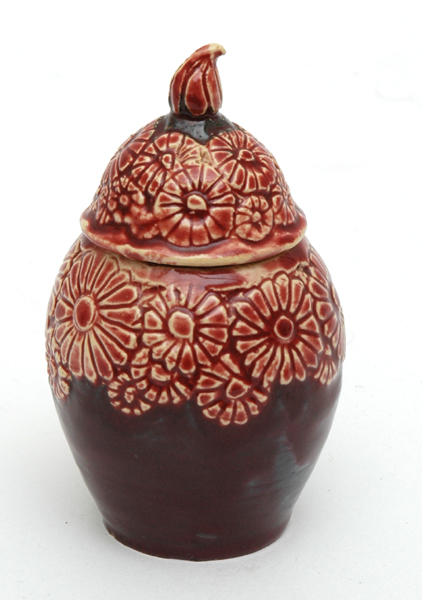 Appraisal: MARGUERITE MAHOOD - Victoria circa A small earthenware lidded pot