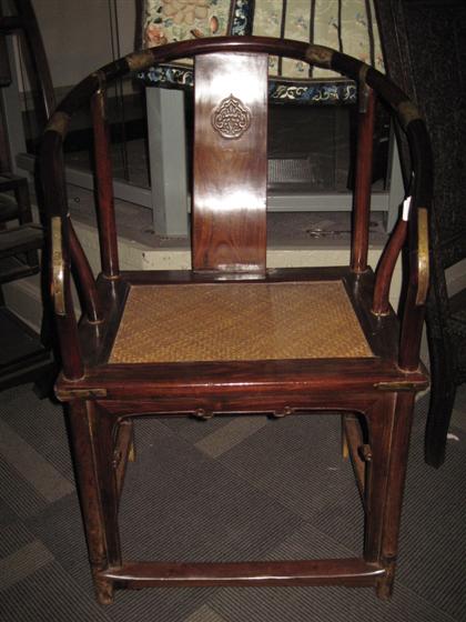 Appraisal: Chinese mixed hardwood horseshoe chair Qing dynasty elements