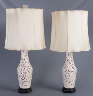 Appraisal: Blanc de Chine Table Lamps Pair White porcelain lamps mounted