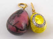 Appraisal: A Russian hallmarked carat gold and yellow enamel egg pendant