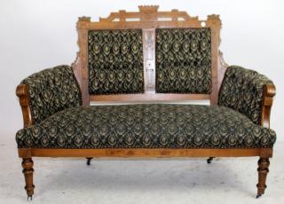 Appraisal: American Victorian tufted upholstered settee with carved detail h x