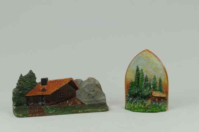 Appraisal: LOT OF TWO LOG CABIN IN WOODS DOORSTOPS Charming scene